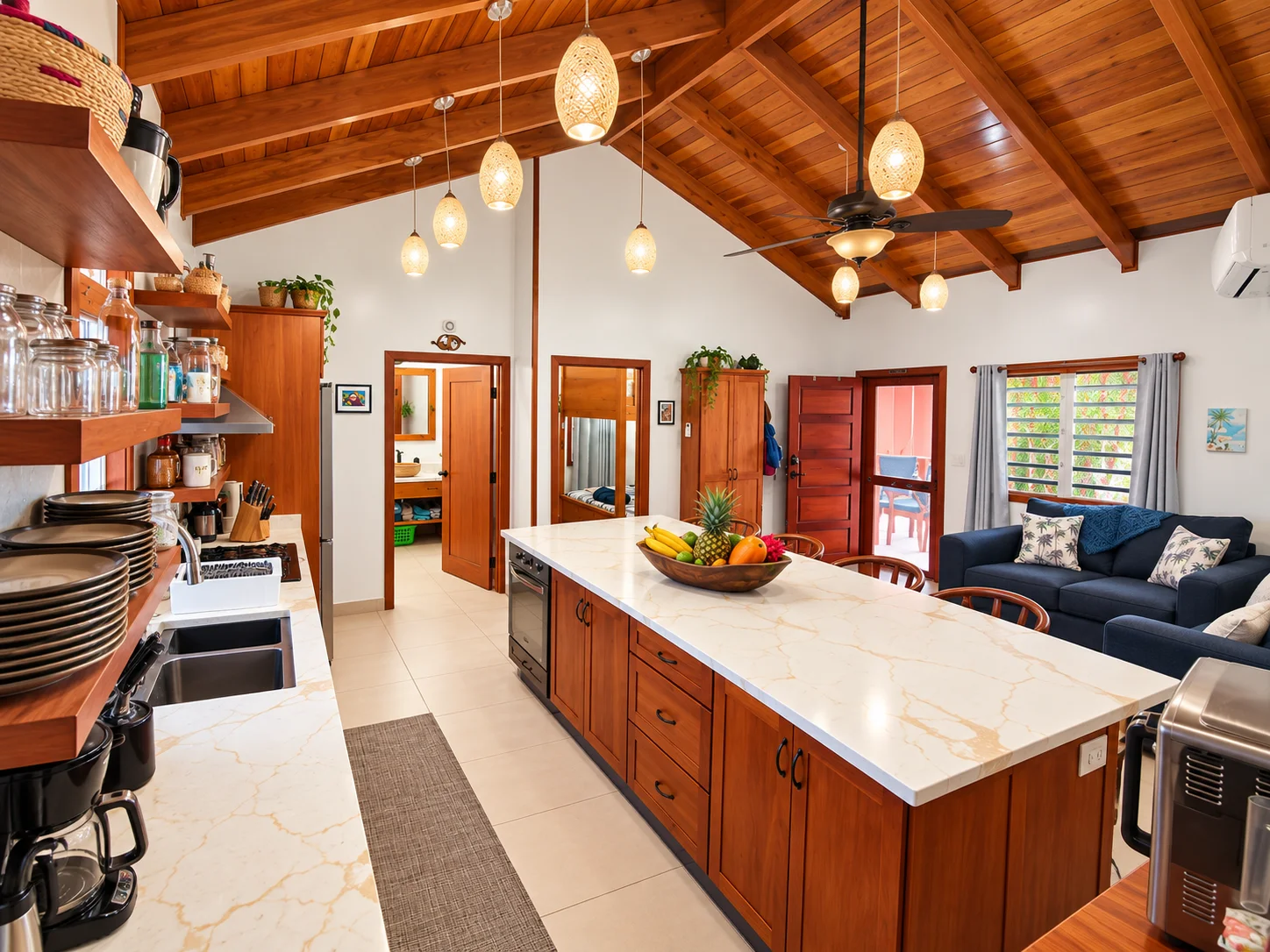 Mahogany kitchen and living area with vaulted wood ceiling